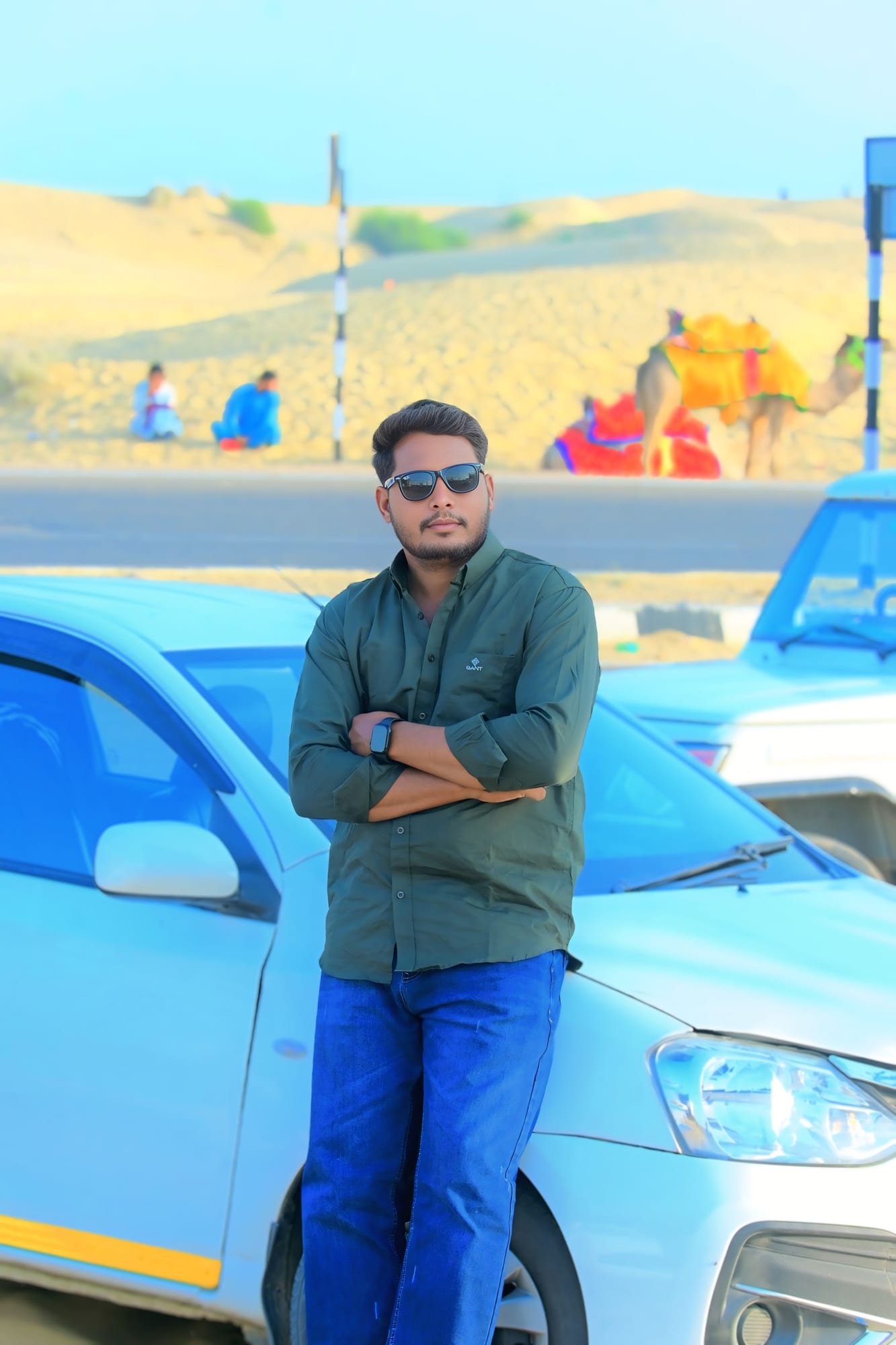 Tarun Kumar, founder and owner of Jaisalmer Jeep & Camel Safari, standing near the Sam sand dunes