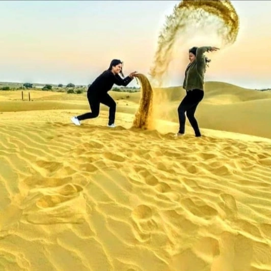 Playing in the sand on the Jaisalmer dunes